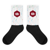 mockup image of thinking big original design on black and white crew socks