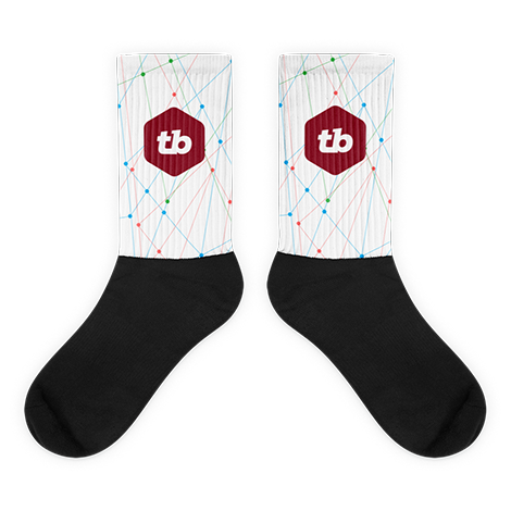 mockup image of thinking big original design on black and white crew socks